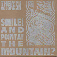 Smile! And Point At The Mountain?